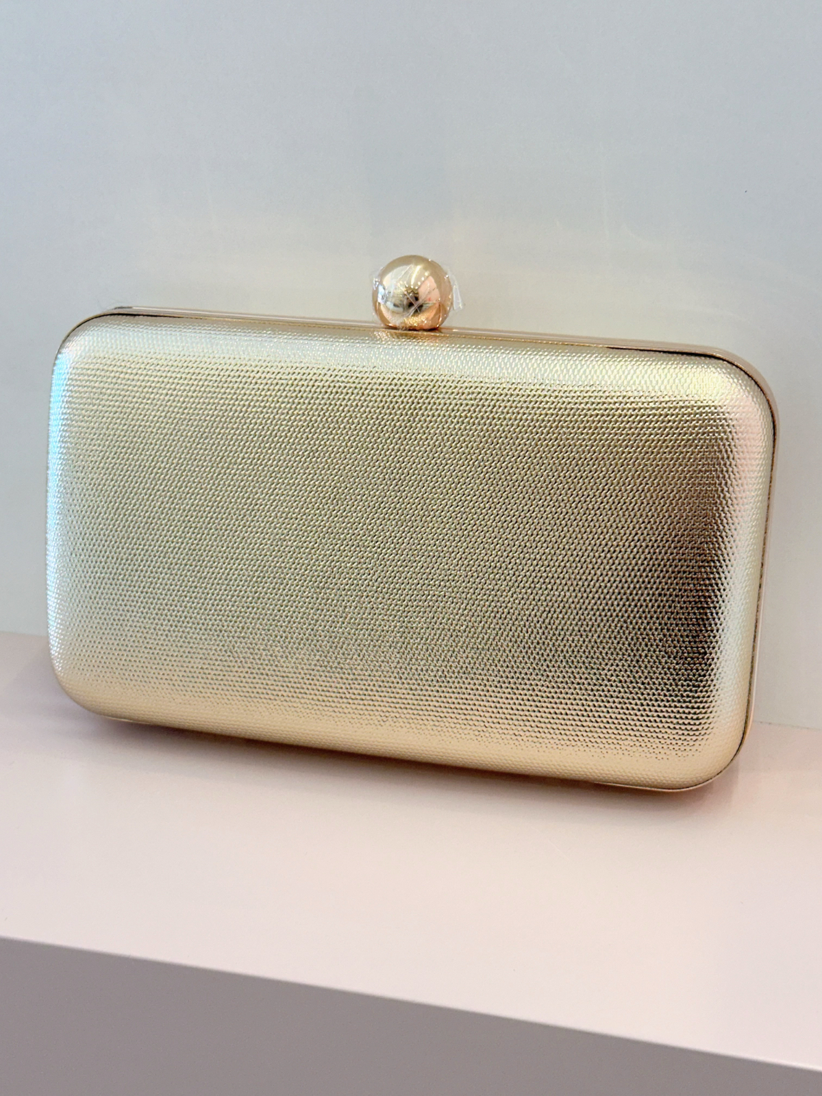 Imagem Clutch quadrada dourada 