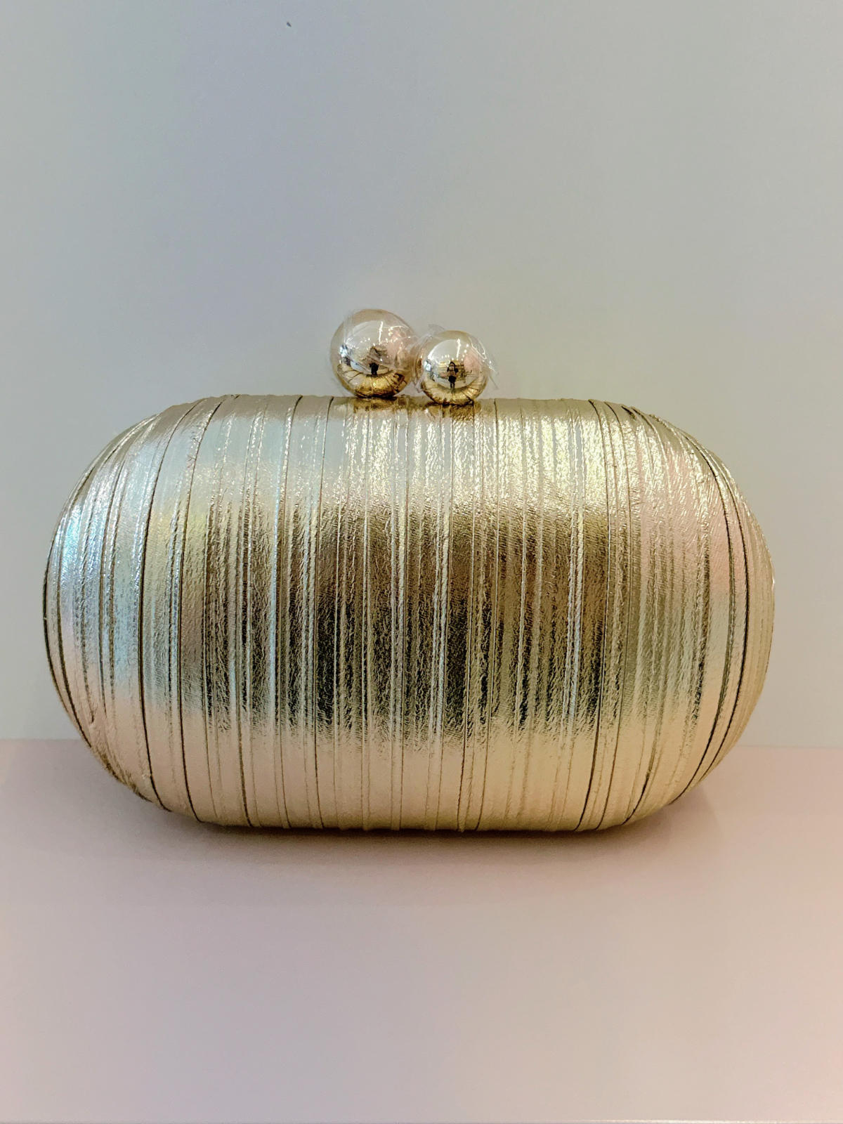 Imagem Clutch dourada tecido 